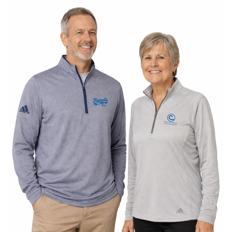 Product Description: Click “More Images” above and expand the window for additional photos.</br></br>We deeply value you as a customer and conservation partner. Once your order is placed, we will begin the customization process promptly. Please note that newly submitted logos may require additional time for embroidery setup and quality review. If we already have your logo on file or you have ordered previously, your order will typically be processed and shipped within approximately one week. All items are shipped directly from Bass Pro Shops or Cabela’s.</br></br>We are committed to ensuring your order is accurate and meets your expectations. To help us achieve this, please provide all required details including sizes, colors, and any customization notes. While we strive to keep all Marketplace items in stock, if availability becomes limited, our team will work with you to resolve any issues and ensure your satisfaction.</br></br>Custom Logo?Email your logo to stewardship@nacdnet.org</br></br>Comfort and versatility come together in these Adidas space dyed quarter zip pullovers, designed for everyday wear in the field, office, or on the go. The lightweight performance fabric offers breathable warmth with a polished, professional appearance. The quarter zip neckline allows for easy temperature control, making this pullover a dependable layering piece year round.</br></br>Available in both men’s and women’s styles, these pullovers provide a comfortable fit that moves easily while maintaining a clean silhouette suitable for work or casual settings.</br></br>Fabric and Features:Soft performance knit with space dyed texture,Quarter zip front with stand up collar,Long sleeves for all season wear,Lightweight and breathable construction,Subtle Adidas branding</br></br>Available Colors:Black Melange,Collegiate Navy Melange,Grey One Heather</br></br>Fit and Sizing</br>Women’s styles offer a gently shaped fit through the body</br>Men’s styles provide a relaxed, classic fit through the shoulders and chest</br>True to size for everyday wear</br>Size up for a more relaxed fit or layering</br></br>Care Instructions</br>Machine wash cold with like colors</br>Tumble dry low or hang to dry</br>Do not bleach</br> Adidas Space Dyed Quarter Zip pullover