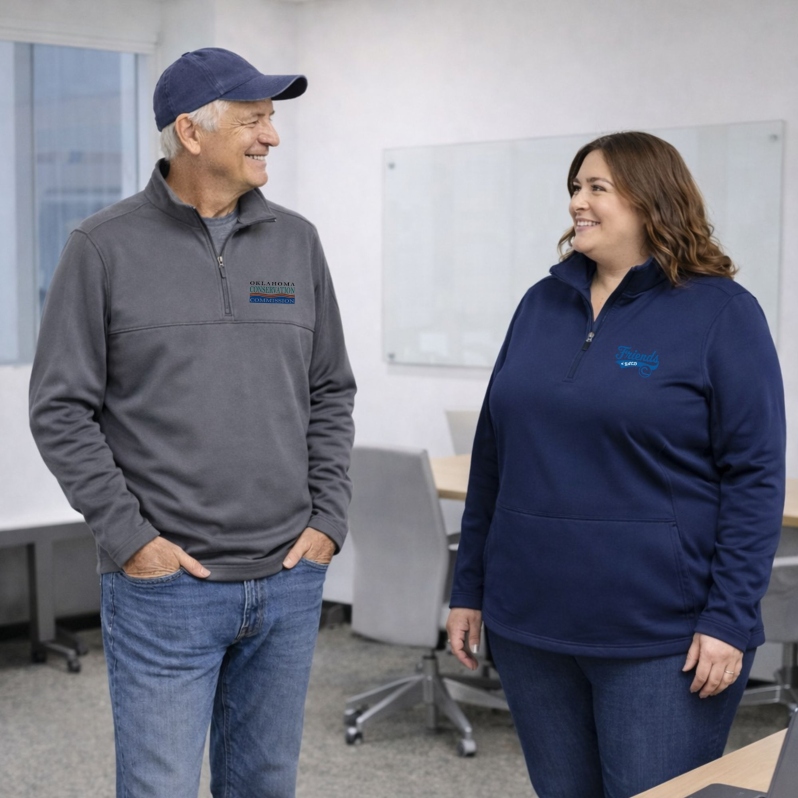 Product Description: Click “More Images” below the thumbnail photo and expand the window for color options.</br></br>Product Description:Stay dry, comfortable, and ready for changing conditions with this Port Authority performance jacket designed for dependable everyday wear. Built for versatility, this jacket offers a clean, professional look while providing reliable protection from wind and weather. It is well suited for workdays, travel, outdoor activities, or layering over everyday apparel.</br></br>Designed with a streamlined silhouette and practical details, this jacket delivers comfort without unnecessary bulk. The full-length zipper and stand-up collar provide adjustable coverage, while secure pockets help keep essentials close at hand. Durable construction and easy care make this jacket a dependable option for unpredictable conditions throughout the year.</br></br>Available Colors:Deep Black,Graphite,River Blue Navy</br></br>Key Features:</br>Durable performance outer shell</br>Full-length front zipper with stand-up collar</br>Secure zippered pockets for everyday essentials</br>Long sleeves with clean finished cuffs</br>Professional, polished design suitable for daily wear</br></br>Sizes</br>Available in Men’s and Women’s sizing from XS to 4XL</br></br>Fit and Sizing Notes</br>Comfortable, practical fit through the shoulders and body</br>Designed for layering over shirts or mid-layers</br>Suggested to size up when layering over heavier apparel</br></br>Fit and Styling</br>A versatile jacket profile that transitions easily from casual to professional settings</br>Clean lines and subtle tailoring create a flattering silhouette without restricting movement</br>Ideal for work, travel, commuting, meetings, and outdoor environments</br></br>Care Instructions</br>Machine wash cold with like colors</br>Tumble dry low or hang to dry</br>Do not bleach</br></br>NACD values you as a customer and a Conservation partner. Once payment has been received, items may take more than 10 days for customization and quality check, so please plan accordingly. All orders will be shipped directly to you from Bass Pro Shops. It is important to us that your order is right the first time, and we strive to exceed your expectations. To ensure accuracy, please provide all required size, color, and customization details. While Bass Pro strives to keep all Marketplace items in stock, if availability becomes limited, staff will work with you to resolve the concern.</br></br>CUSTOM LOGOS AVAILABLE</br>Interested in customized logo wear for your Conservation District or State Association? Complete the customization form and email it to stewardship@nacdnet.org</br> Port Authority Smooth Fleece Quarter Zip